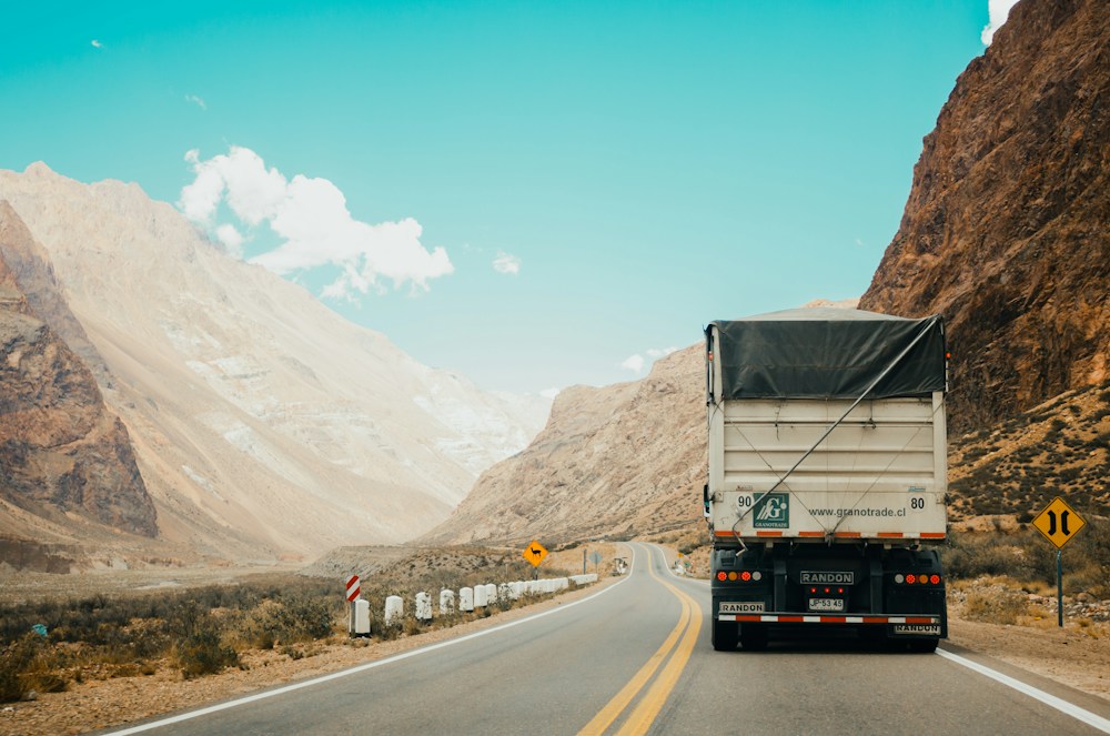 Freight truck transporting cargo by road